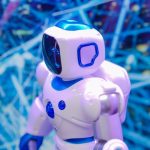 Collection of free AI tools displayed on computer screens showing automation capabilities